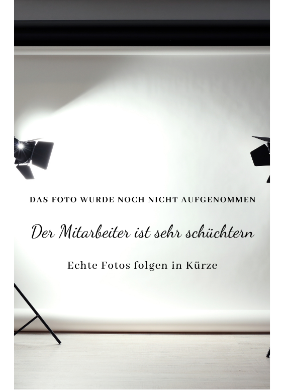 Hinweistafel für ein noch nicht aufgenommenes Mitarbeiterfoto der Kauffrau
